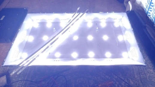 Ganti backlight karena ada titik cahaya putih